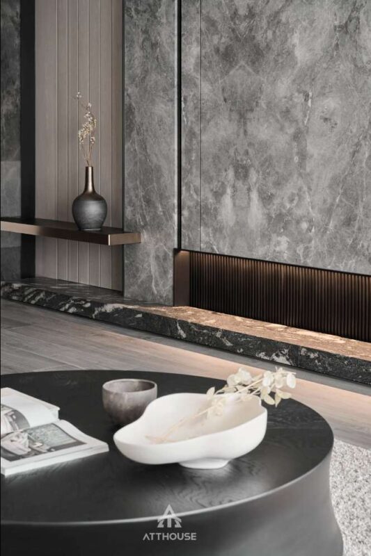 Sự kết hợp hài hòa giữa vật liệu cao cấp trong thiết kế nội thất phòng khách nhà phố Lê Thánh Tông.